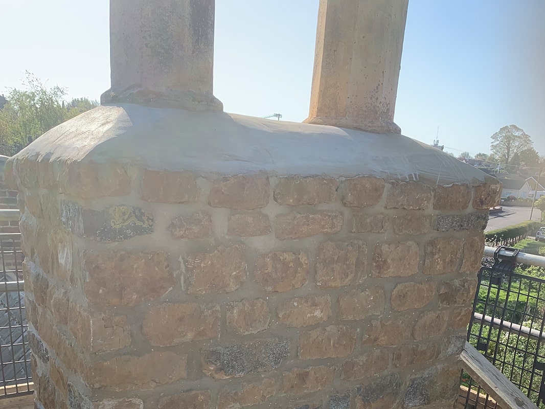 A chimney after it has been repaired from cracks and damage