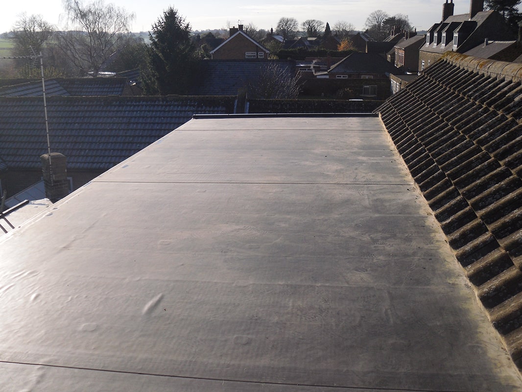 EQDM flat roof on top of a building