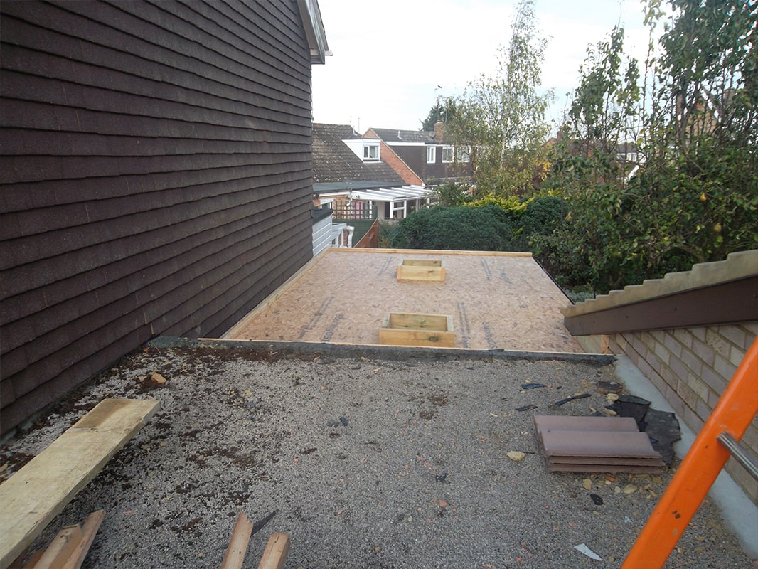 EQDM flat roofing in the process of being fitted